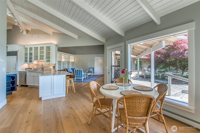 376 Killebrew Lake Rd, Orcas Island, WA 98280 - dining area with baseboard heating, healthy amount of natural light, and light wood finished floors