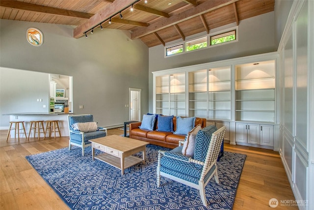 376 Killebrew Lake Rd, Orcas Island, WA 98280 - living room featuring wood ceiling, high vaulted ceiling, track lighting, hardwood / wood-style flooring, and beam ceiling