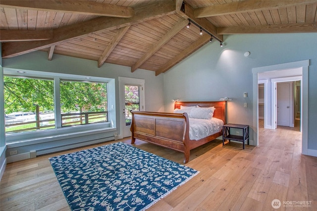 376 Killebrew Lake Rd, Orcas Island, WA 98280 - bedroom with baseboard heating, wood ceiling, hardwood / wood-style floors, and access to outside