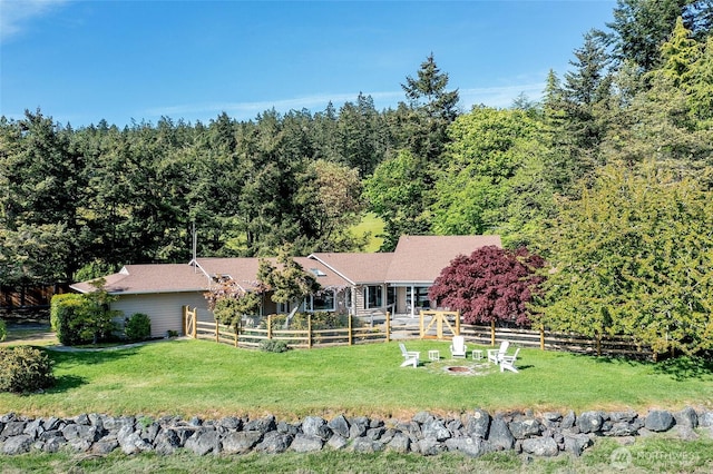 376 Killebrew Lake Rd, Orcas Island, WA 98280 - back of house featuring a wooded view and an outdoor fire pit