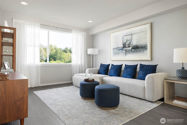 living room featuring wood finished floors, recessed lighting, and baseboards