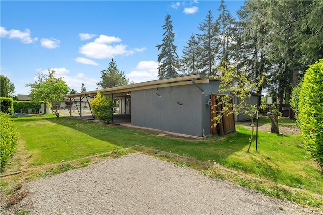 back of house with a yard