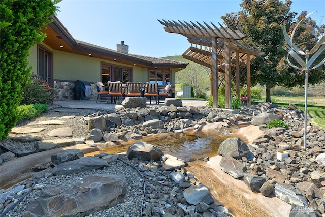 1041 Red Sky Dr, Yakima, WA 98903 - view of yard with a patio area and a garden pond