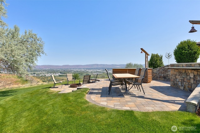 1041 Red Sky Dr, Yakima, WA 98903 - view of green lawn with a mountain view and a patio