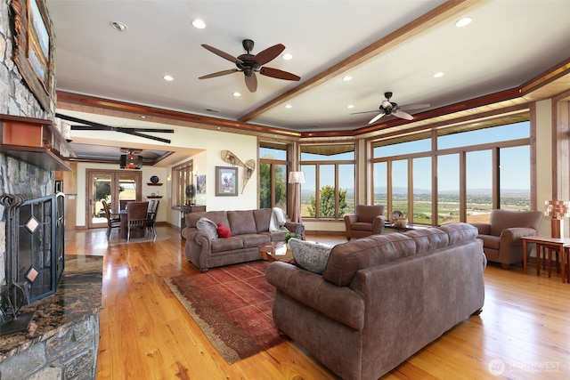 1041 Red Sky Dr, Yakima, WA 98903 - living room featuring ceiling fan, hardwood / wood-style flooring, beam ceiling, a fireplace, and recessed lighting