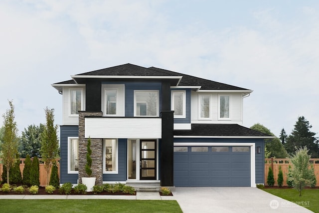 view of front of property with fence, concrete driveway, an attached garage, and a shingled roof