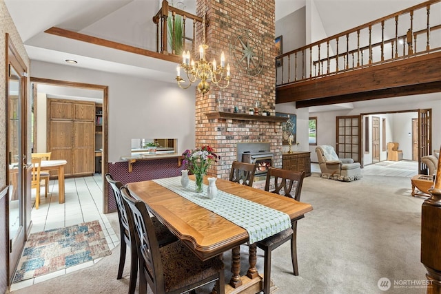 14413 139th Ave SE, Snohomish, WA 98290 - dining room with high vaulted ceiling, light carpet, and a chandelier
