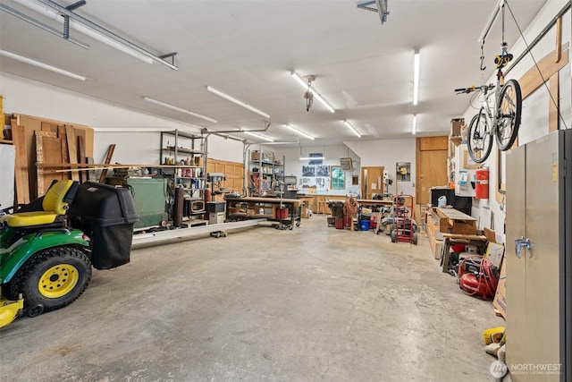 14413 139th Ave SE, Snohomish, WA 98290 - garage featuring a workshop area