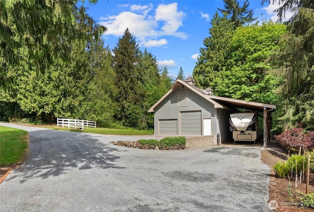 14413 139th Ave SE, Snohomish, WA 98290 - garage featuring a detached garage and driveway