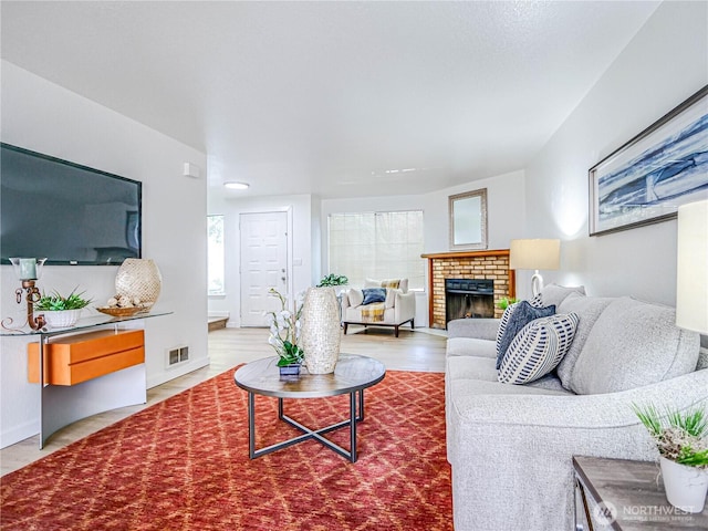 8407 18th Ave W Unit 4-102, Everett, WA 98204 - living room with a fireplace and wood finished floors