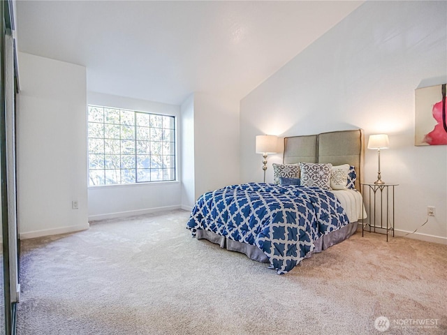 8407 18th Ave W Unit 4-102, Everett, WA 98204 - bedroom with carpet flooring, baseboards, and vaulted ceiling