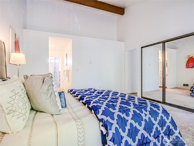 8407 18th Ave W Unit 4-102, Everett, WA 98204 - carpeted bedroom with a closet, beamed ceiling, and high vaulted ceiling