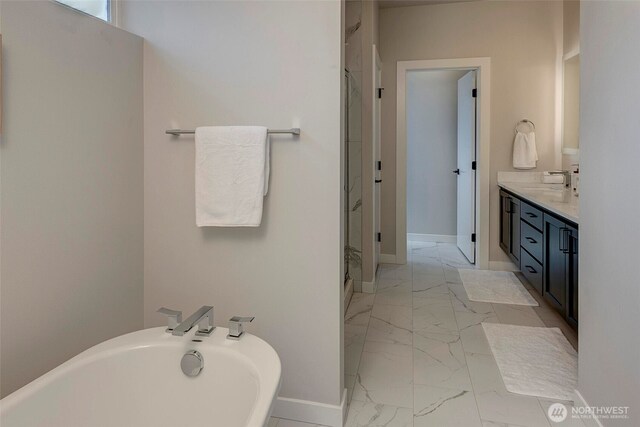 16215 Simonds Rd NE Unit 3, Kenmore, WA 98028 - full bathroom with marble finish floors, a freestanding tub, baseboards, and a shower stall