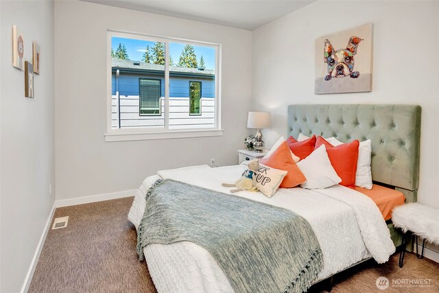 16215 Simonds Rd NE Unit 3, Kenmore, WA 98028 - bedroom with baseboards and carpet
