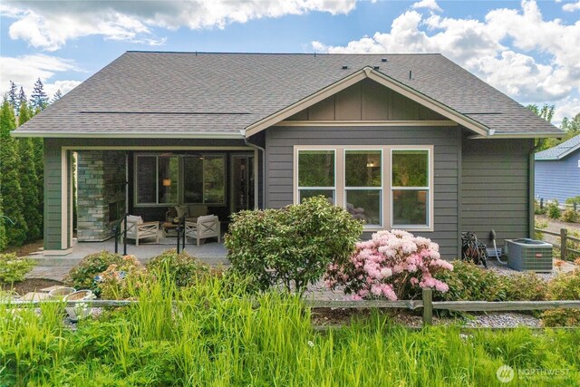 14419 190th Avenue Ct E, Bonney Lake, WA 98391 - rear view of house with central AC, a patio area, roof with shingles, and an outdoor hangout area