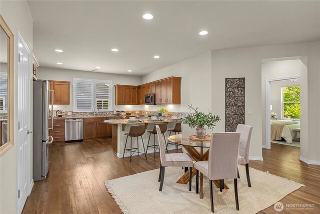 14419 190th Avenue Ct E, Bonney Lake, WA 98391 - dining area with dark wood-type flooring, recessed lighting, and baseboards
