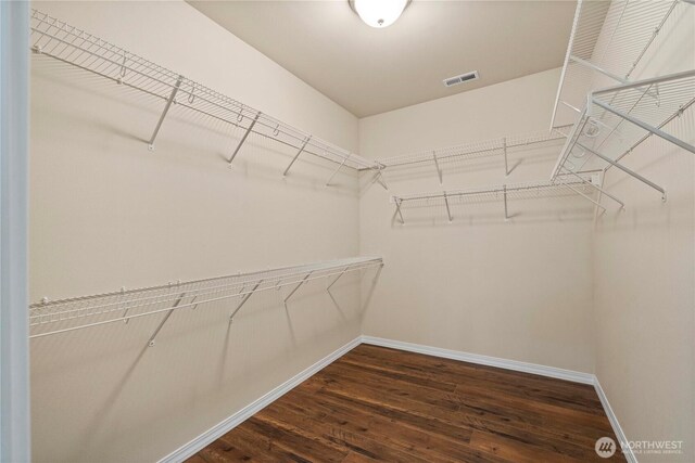 14419 190th Avenue Ct E, Bonney Lake, WA 98391 - walk in closet featuring dark wood-style flooring