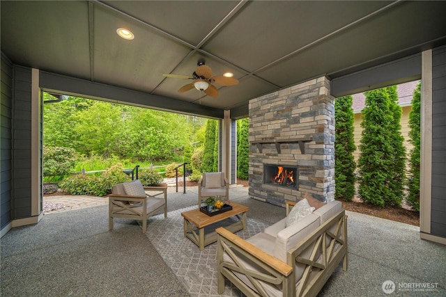 14419 190th Avenue Ct E, Bonney Lake, WA 98391 - view of patio / terrace featuring a ceiling fan and an outdoor living space with a fireplace
