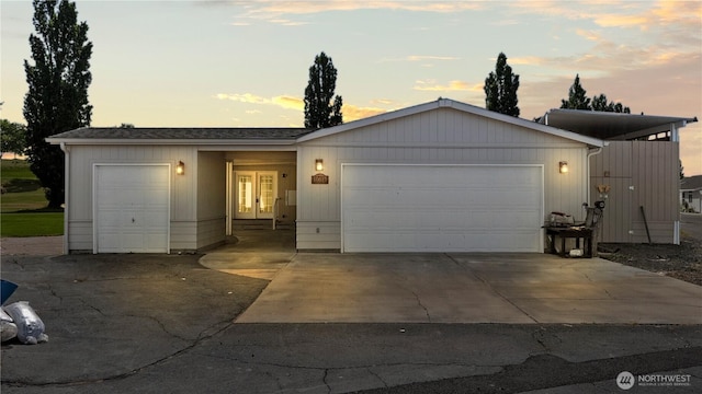 10615 SE Handicap Dr, Warden, WA 98857 - view of front of home with an attached garage, french doors, and driveway