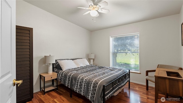 10615 SE Handicap Dr, Warden, WA 98857 - bedroom with baseboards, wood finished floors, vaulted ceiling, and ceiling fan