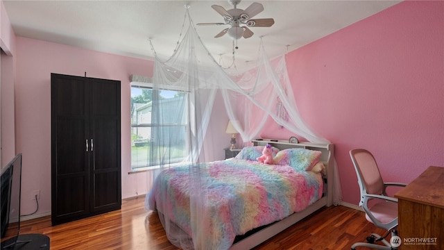10615 SE Handicap Dr, Warden, WA 98857 - bedroom featuring wood finished floors and an office area