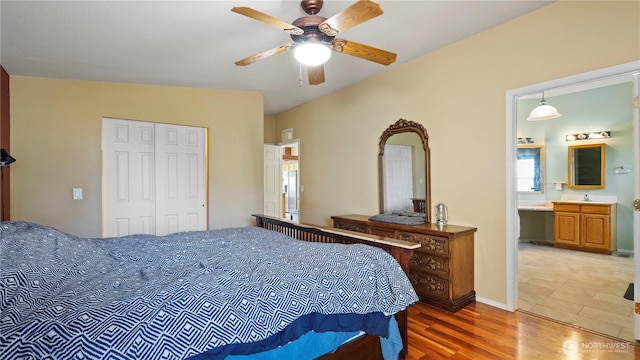 10615 SE Handicap Dr, Warden, WA 98857 - bedroom with wood finished floors, a closet, a ceiling fan, and ensuite bathroom