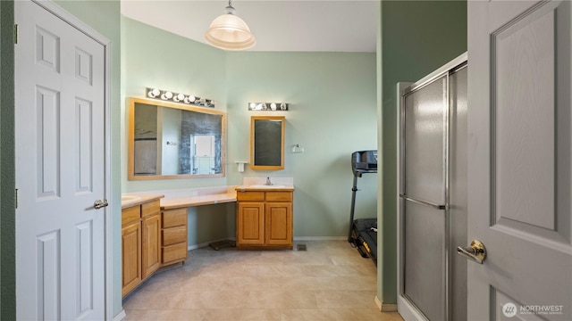 10615 SE Handicap Dr, Warden, WA 98857 - bathroom featuring a shower stall, baseboards, and vanity
