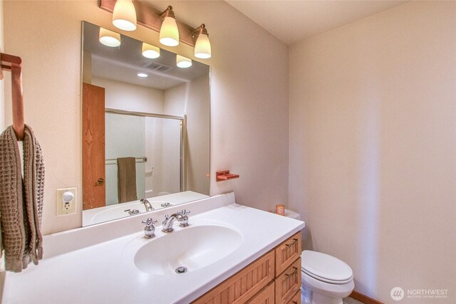 91 Coastline Dr, Orcas Island, WA 98279 - bathroom with a shower stall, vanity, and toilet