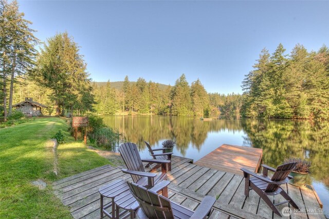 91 Coastline Dr, Orcas Island, WA 98279 - dock area featuring a water view, a forest view, and a yard