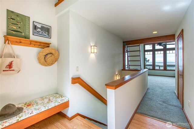 91 Coastline Dr, Orcas Island, WA 98279 - hall featuring an upstairs landing, baseboards, wood finished floors, and recessed lighting