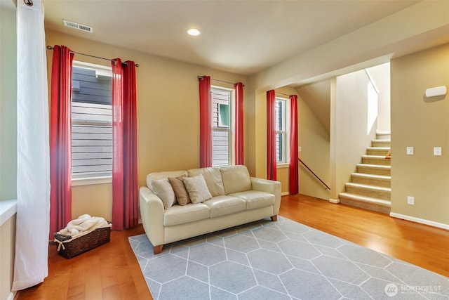 9831 NE 138th Pl, Kirkland, WA 98034 - living room with wood finished floors, recessed lighting, plenty of natural light, and stairway