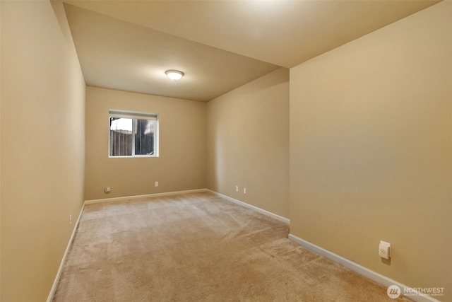 9831 NE 138th Pl, Kirkland, WA 98034 - spare room featuring light colored carpet and baseboards