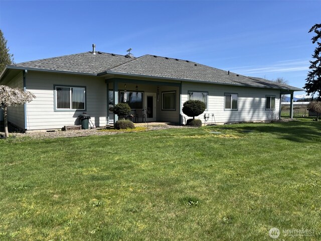 137 La Due Cemetery Rd, Onalaska, WA 98570 - back of house featuring a lawn and roof with shingles