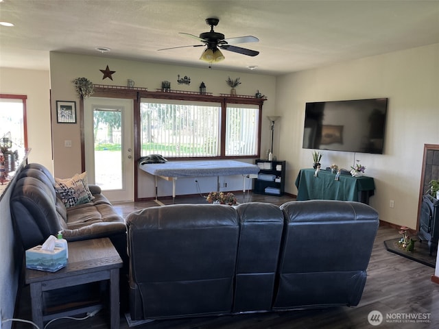 137 La Due Cemetery Rd, Onalaska, WA 98570 - living room featuring wood finished floors, ceiling fan, and baseboards