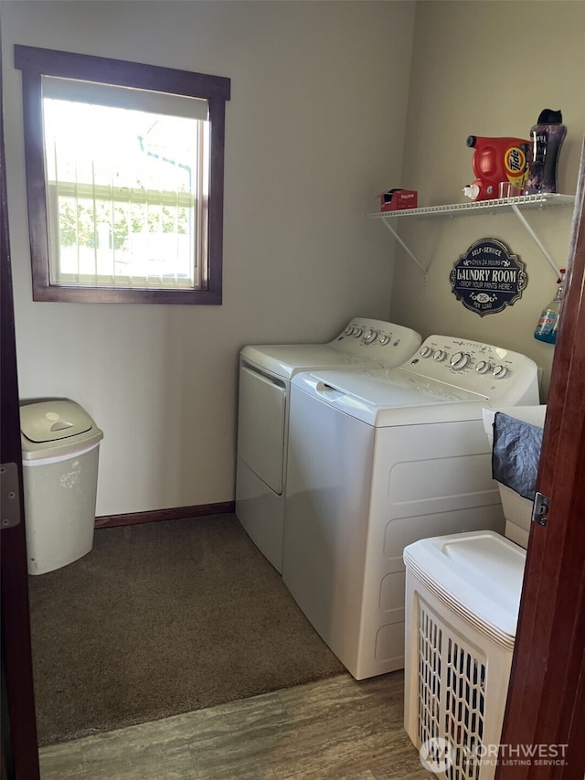 137 La Due Cemetery Rd, Onalaska, WA 98570 - laundry area featuring washing machine and dryer and wood finished floors