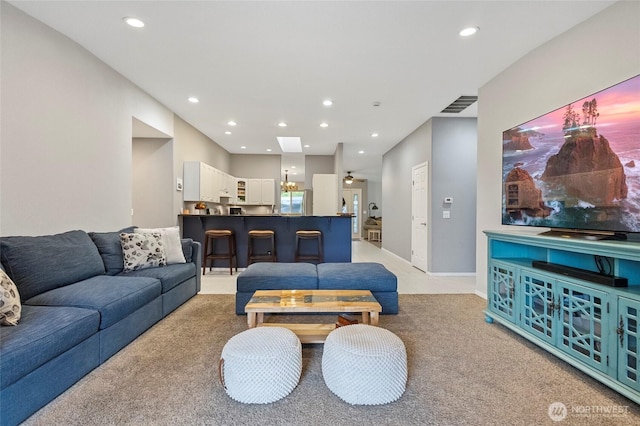 1555 Silver Lake Rd, Oak Harbor, WA 98277 - living area with recessed lighting, light colored carpet, and baseboards