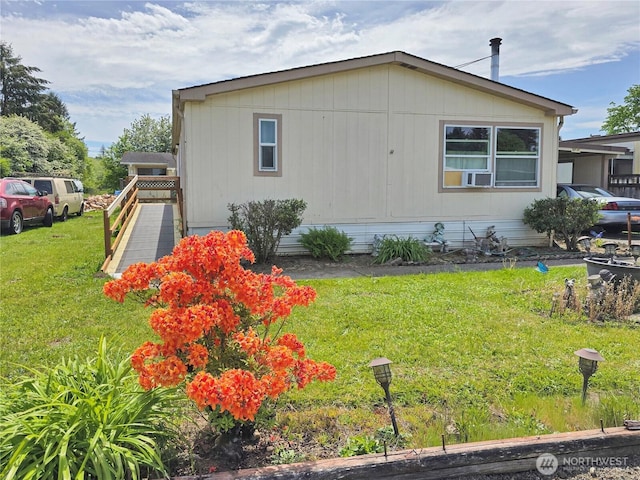 3516 Harrison Ave Unit H, Centralia, WA 98531 - view of side of home featuring a lawn