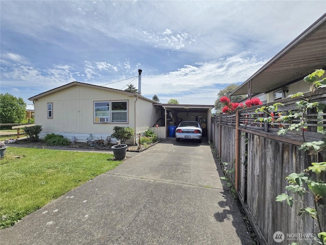 3516 Harrison Ave Unit H, Centralia, WA 98531 - view of side of home with driveway and an attached carport