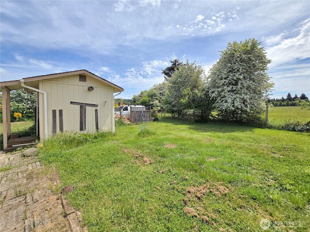 3516 Harrison Ave Unit H, Centralia, WA 98531 - view of grassy yard with an outbuilding and a storage unit