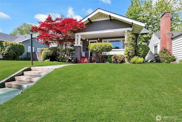 3708 N Madison St, Tacoma, WA 98407 - view of front of home featuring a front yard and covered porch