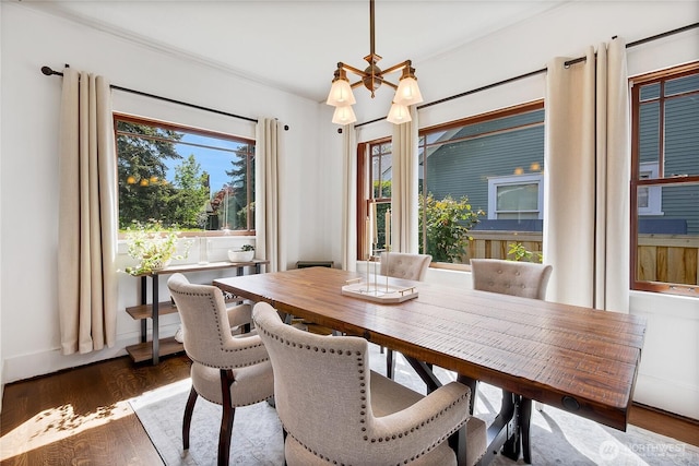 3708 N Madison St, Tacoma, WA 98407 - dining space with a chandelier and wood finished floors
