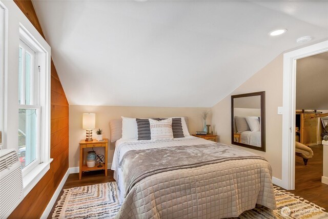3708 N Madison St, Tacoma, WA 98407 - bedroom with vaulted ceiling, wood finished floors, baseboards, and recessed lighting
