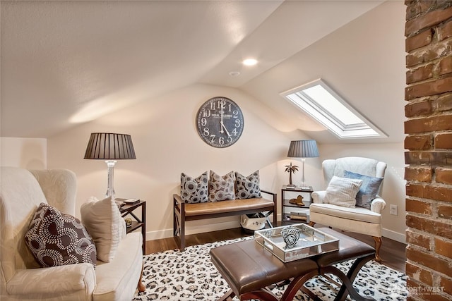 3708 N Madison St, Tacoma, WA 98407 - living area with lofted ceiling, wood finished floors, a skylight, and baseboards