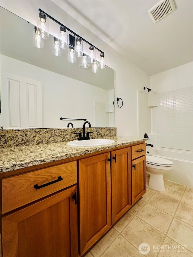 4660 NE 3rd Ct Unit J3, Renton, WA 98059 - full bath featuring tile patterned flooring, toilet, vanity, and washtub / shower combination