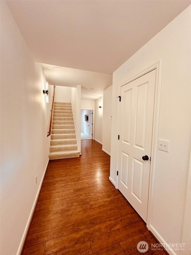 4660 NE 3rd Ct Unit J3, Renton, WA 98059 - corridor featuring stairs, hardwood / wood-style floors, and baseboards
