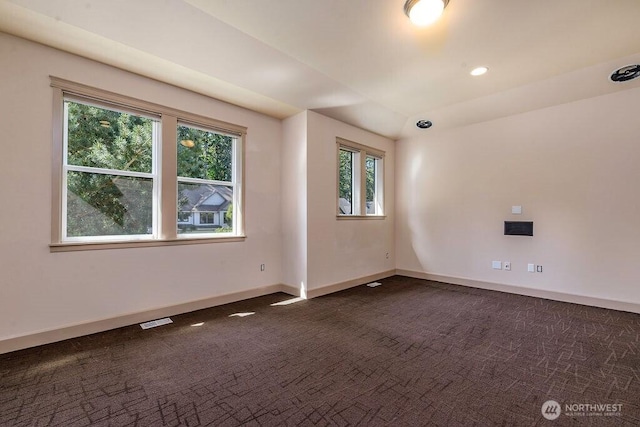 1715 131st St S, Tacoma, WA 98444 - empty room with dark carpet and baseboards