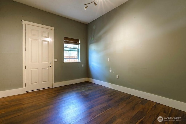 1715 131st St S, Tacoma, WA 98444 - unfurnished room featuring dark wood-style floors and baseboards