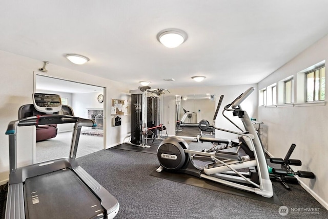 exercise room with baseboards