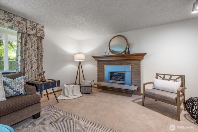 1102 S Villard St, Tacoma, WA 98465 - living area with carpet floors, a textured ceiling, a brick fireplace, and baseboards