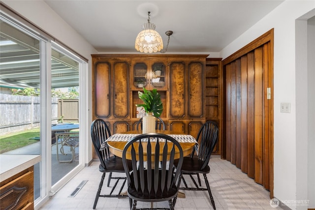 1102 S Villard St, Tacoma, WA 98465 - dining area with light flooring and a chandelier